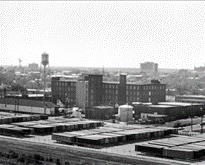 Image of cigar factory and the Eastside from the view of the Cooper River Bridge